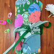 Load image into Gallery viewer, JOERIA KNITS Crochet Hook Storage Grazing Sheep with Green Ties Crochet Hook Storage Wraps joeriaknits