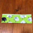 Load image into Gallery viewer, Joeriaknits Knitting Needle Storage 6" DPN / Herwick Sheep on Green Knitting Needle Cozy: Handcrafted joeriaknits