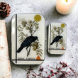 Load image into Gallery viewer, Notions Tin by Firefly Notes featuring a vintage crow design, perfect for organizing shiny things.
