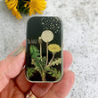 Load image into Gallery viewer, Notions Tin Firefly Notes featuring a vintage dandelion illustration on a glossy storage tin.

