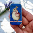 Load image into Gallery viewer, Notions Tin Firefly Notes featuring Lady Bunbury the bunny in a pink waistcoat.
