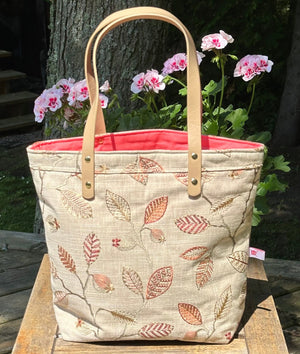 Project Bags for Knitters and Crocheters featuring a floral design and durable handles.