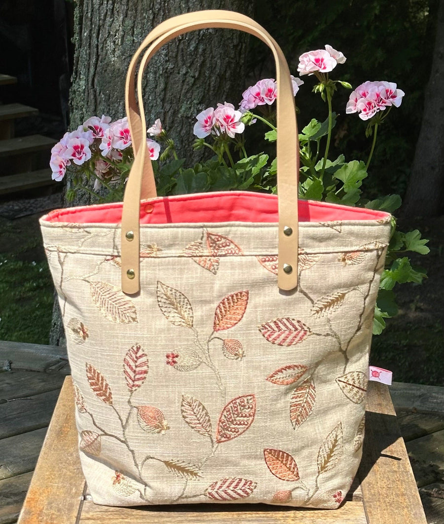 Project Bags for Knitters and Crocheters featuring a floral design and durable handles.