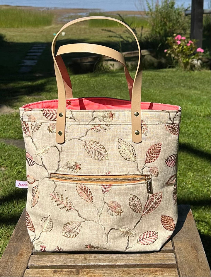 Project Bags for Knitters and Crocheters featuring a floral design, durable handles, and an exterior zippered pocket.