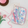 Load image into Gallery viewer, KnitPro Vybe Crochet Hook Sets featuring colorful handles and a stylish storage case with geometric patterns.
